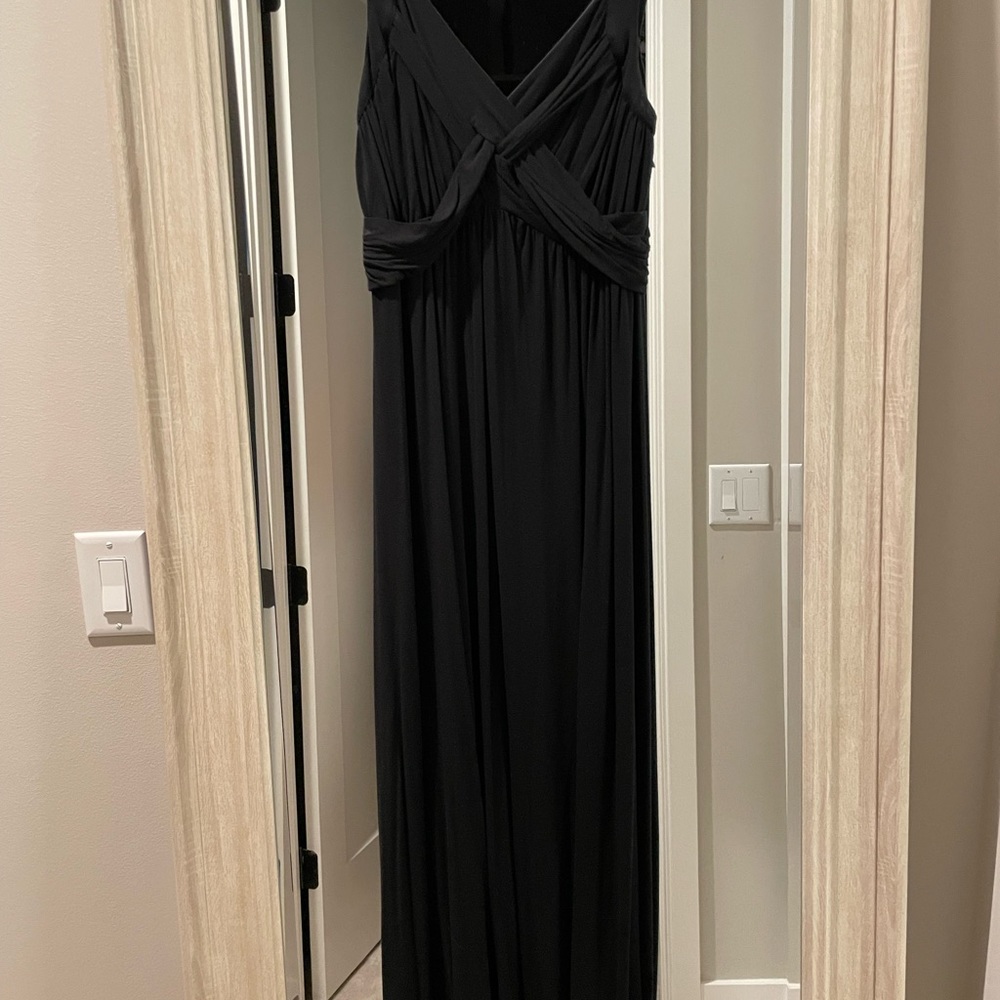 Long black cotton dress.